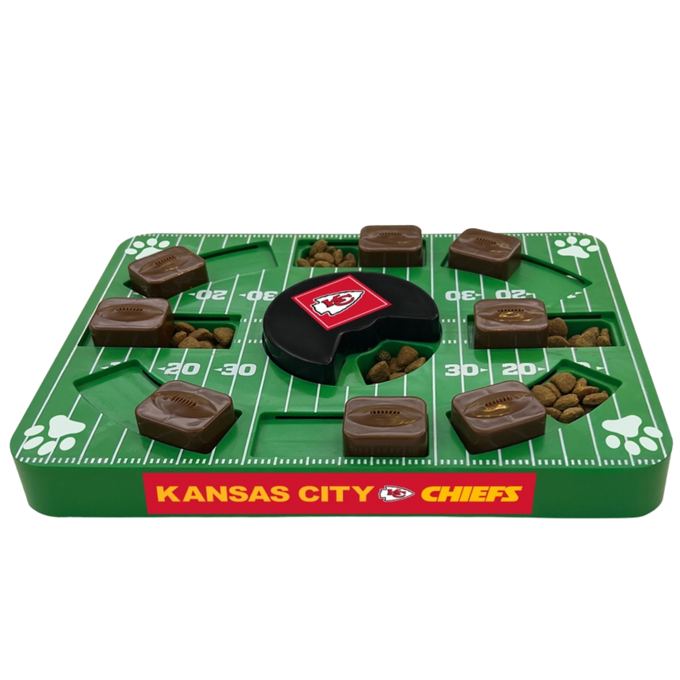 Green plastic field with brown sliding football shaped compartments to put pet food in. KC Chiefs themed pet puzzler