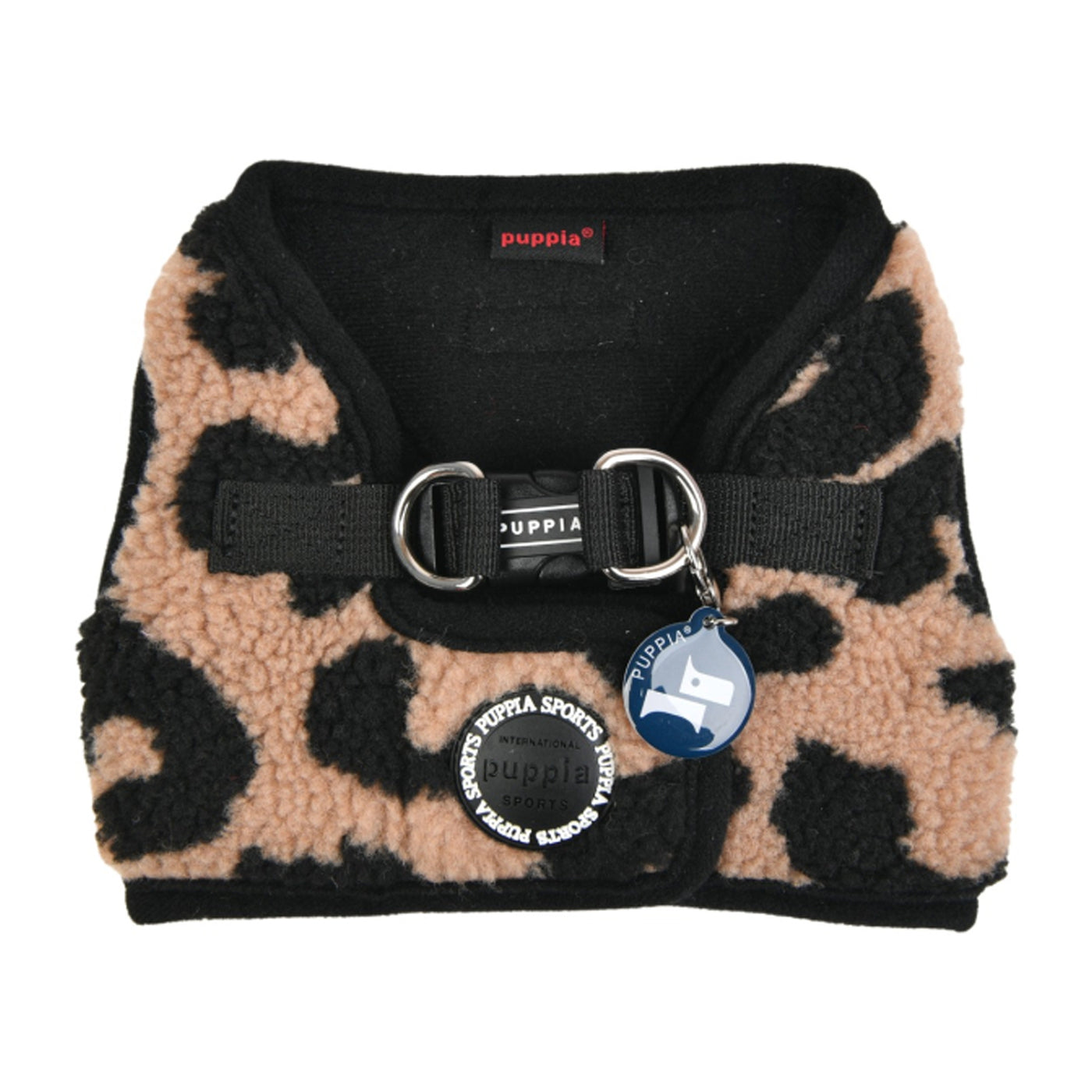 Leopard print dog harness with black interior and Puppia branding on a white background