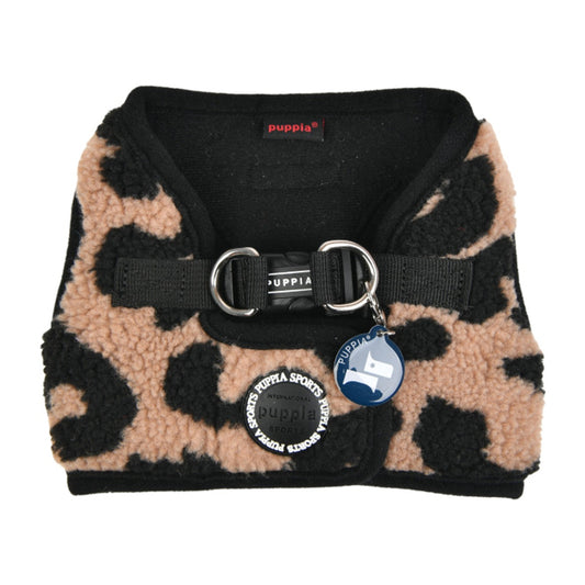 Leopard print dog harness with black interior and Puppia branding on a white background