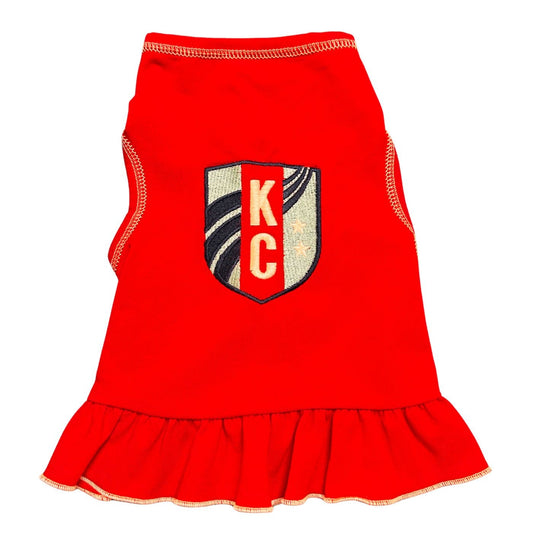 Red pet dress with aKC logo on a white background