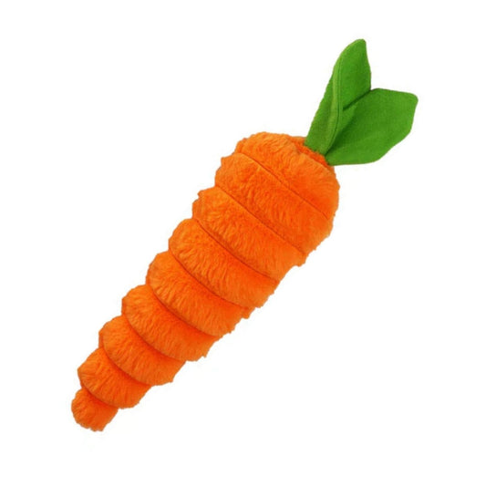 Carrot-shaped toy with a green leaf on a white background