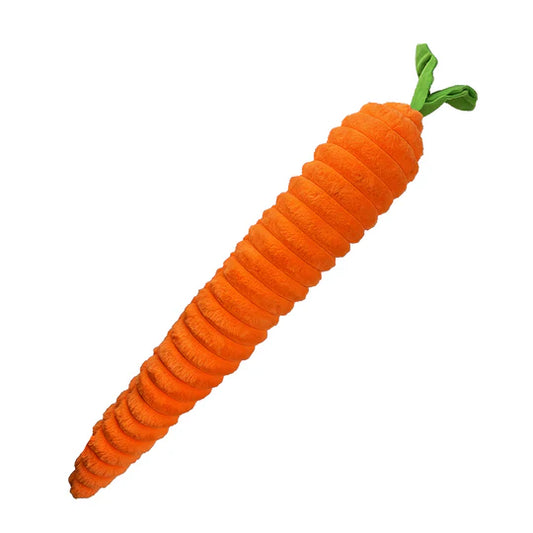 Carrot-shaped toy with green leaves on a white background