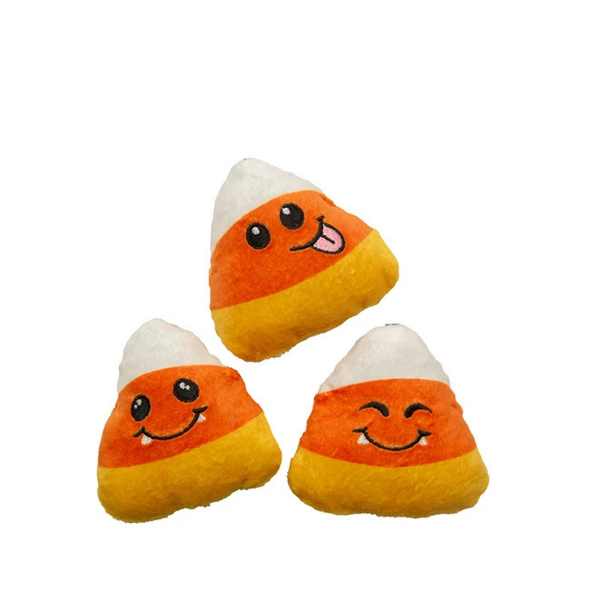 Three plush candy corn toys with embroidered happy faces, arranged on a plain white background.