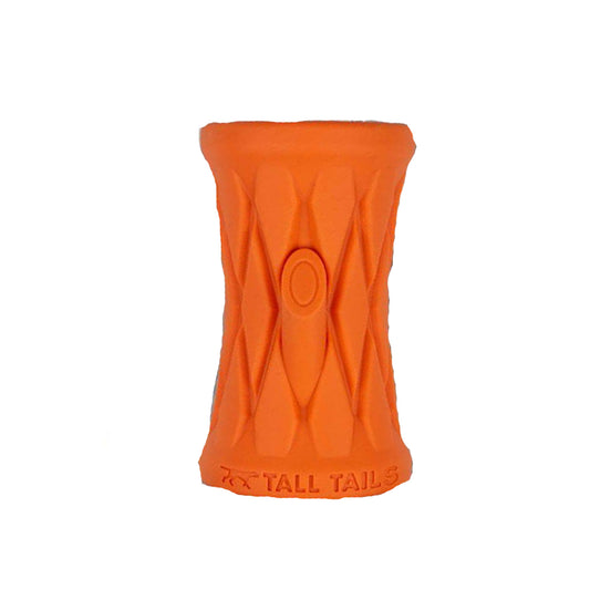Orange durable textured dog toy in the shape of a tree trunk with 'Tall Tails' branding on a white background